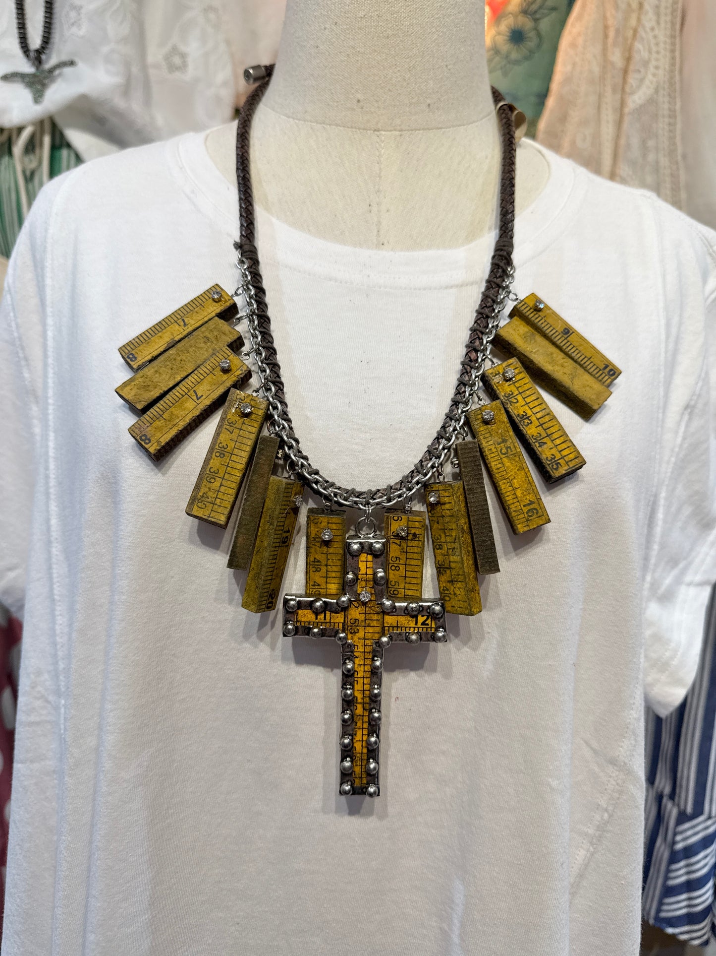 A Rare Bird Measuring Tape Cross Necklace