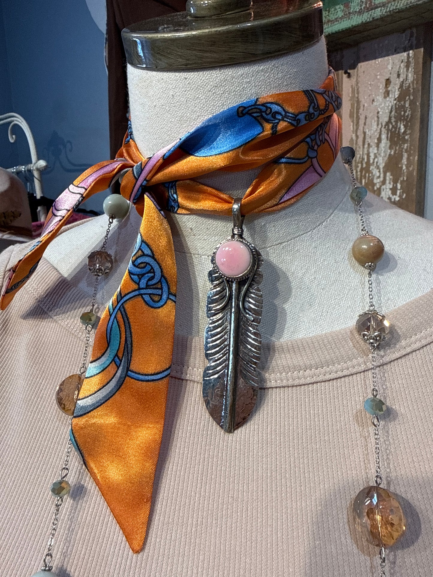 Tibetan Pink Conch Feather Pendant