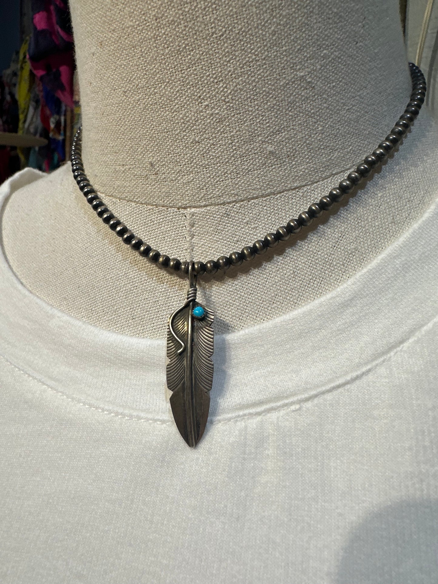Navajo Chris Charley Sterling Silver & Kingman Feather Pendant