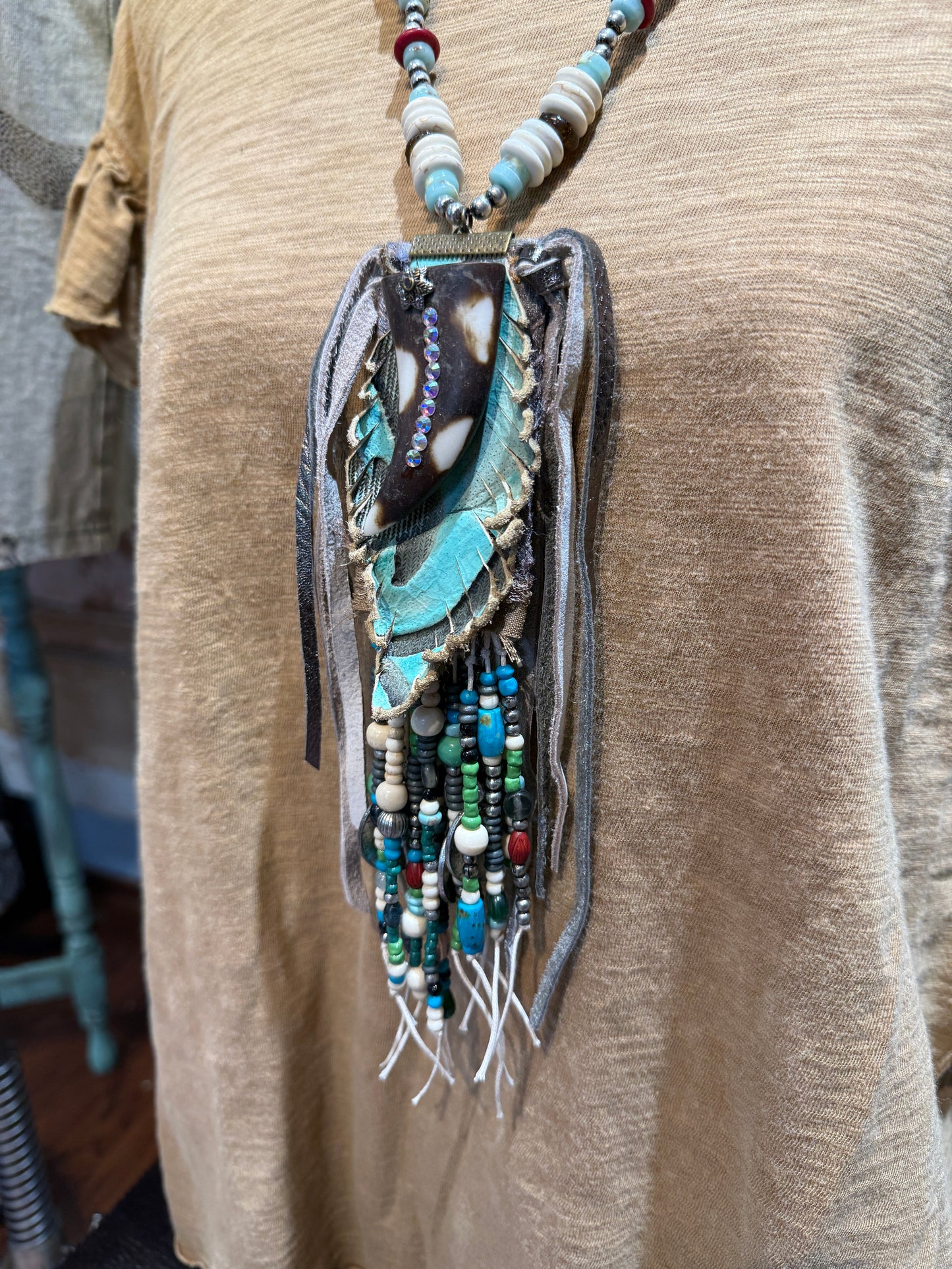 A Rare Bird Bone Horn Hand Cut Beaded Necklace